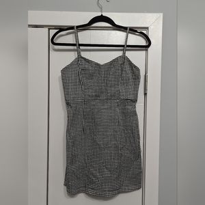 Plaid mini dress. Fits really well and very versatile, can be formal or casual.